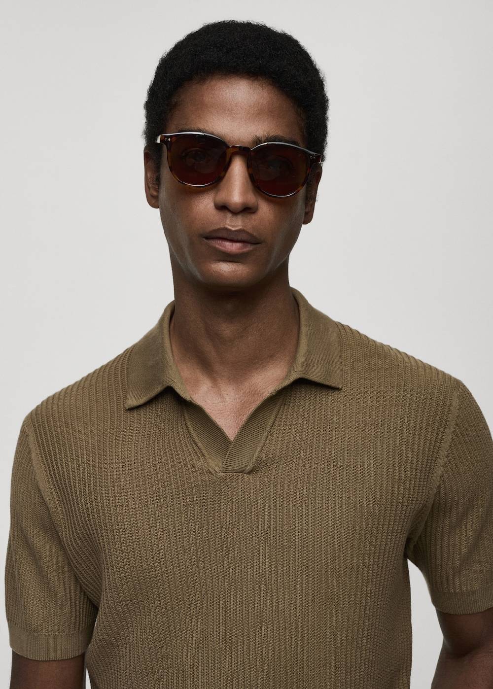 Mango Geripptes Strick-Poloshirt aus Baumwolle Bis zu 50% Rabatt