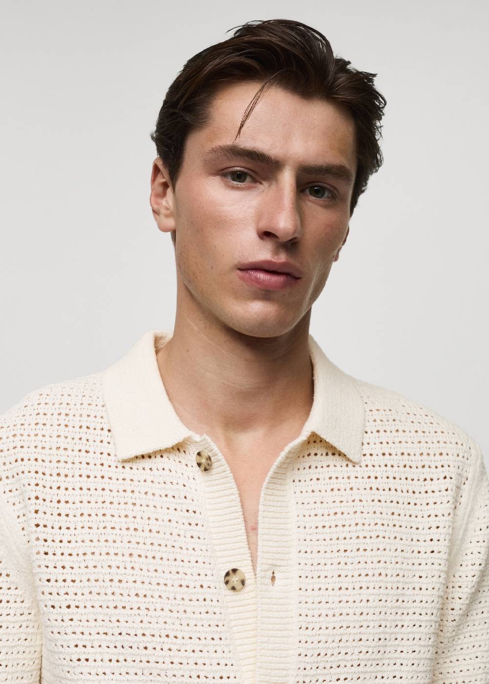 Mango Geknöpftes Strick-Poloshirt mit Lochmuster Blitzangebot