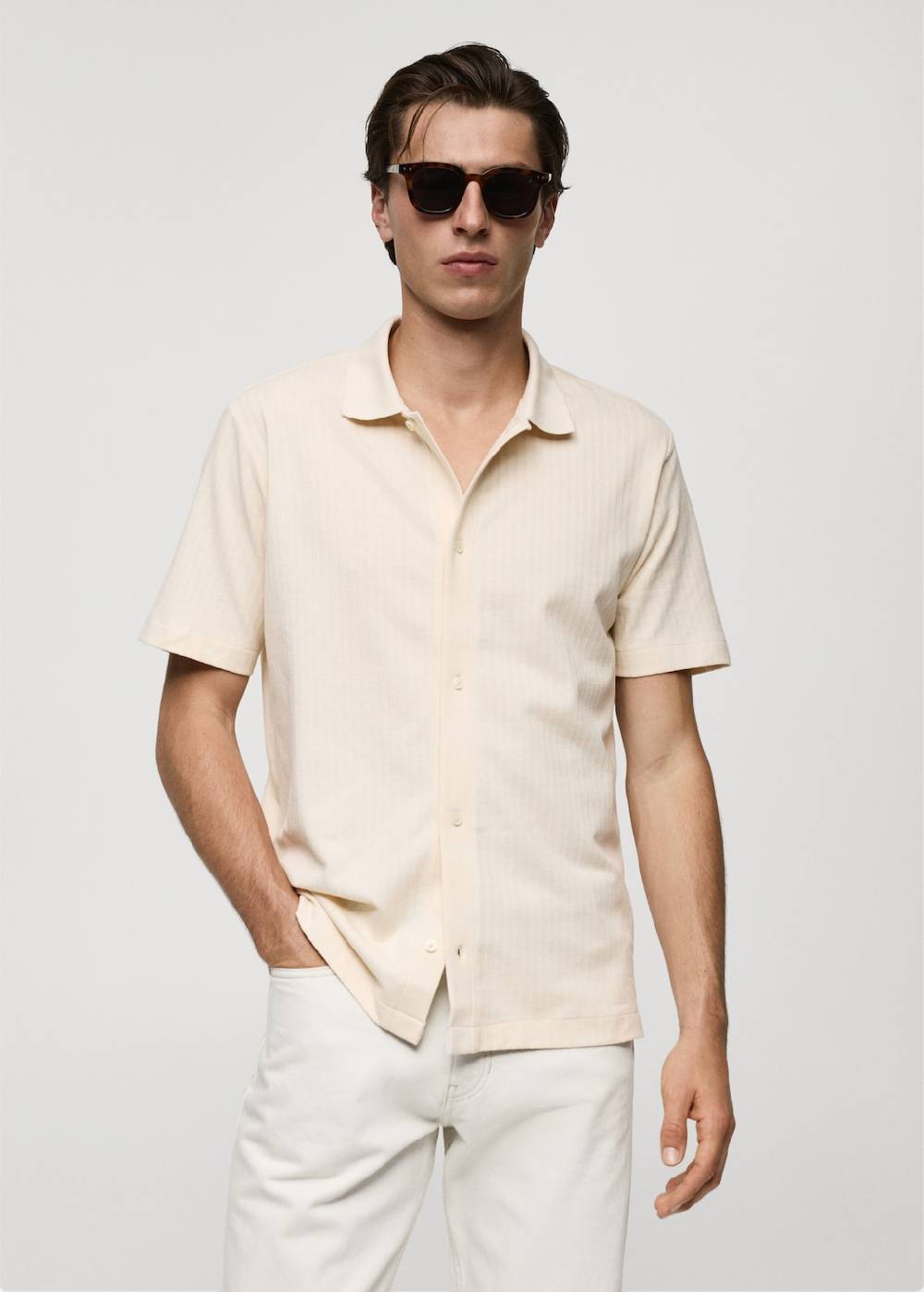 Mango Geknöpftes Regular Fit-Poloshirt mit Struktur Kostenlose Rückgabe